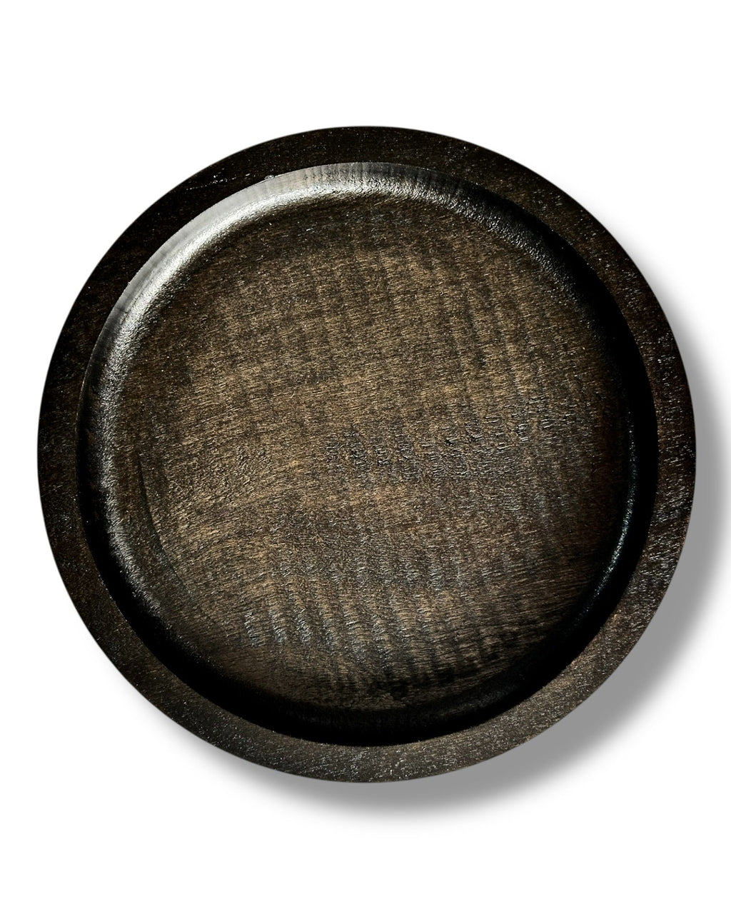 A black wooden tray with a textured grain finish, photographed from directly above on a white background with a soft drop shadow.