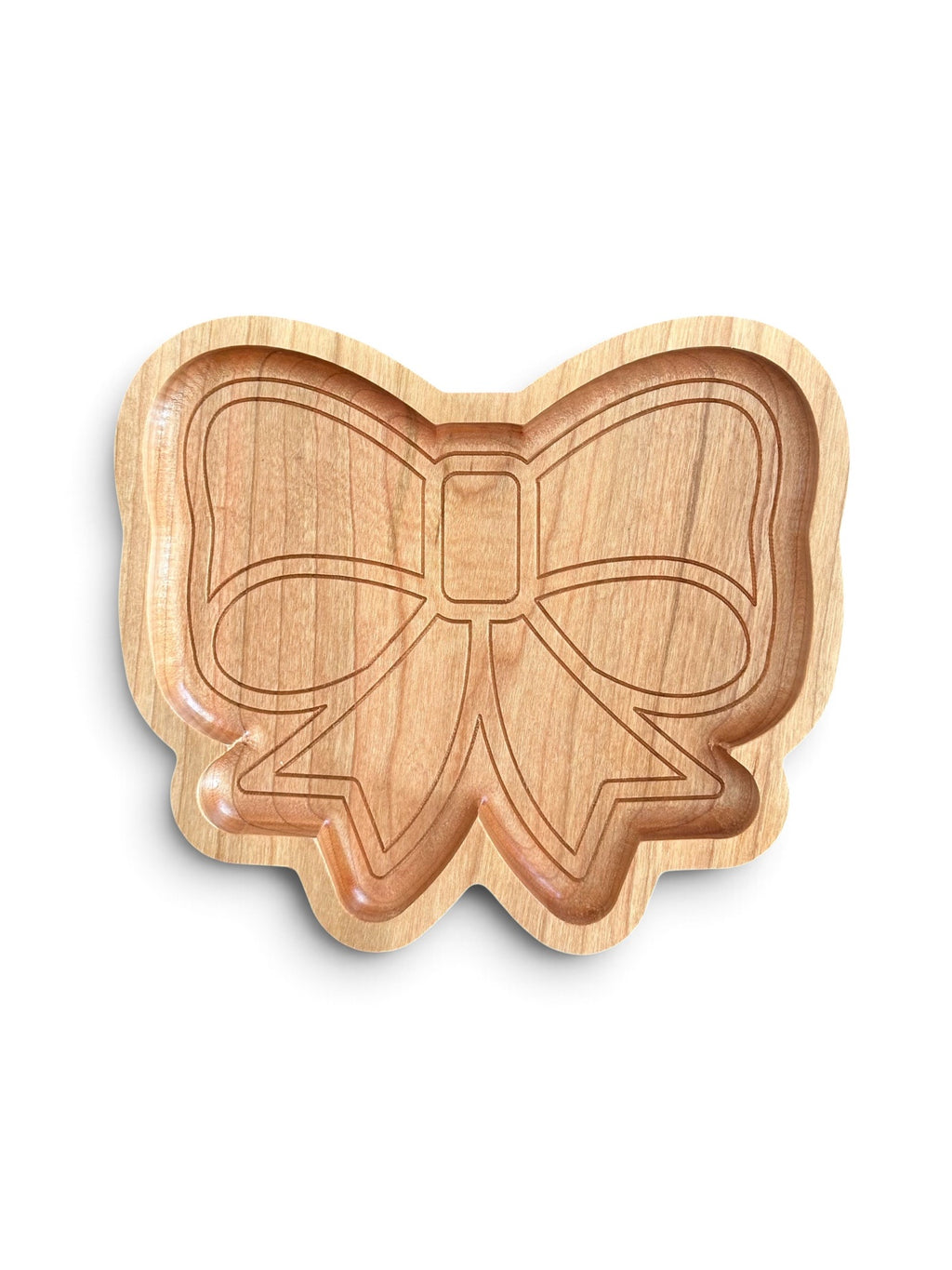 A light natural wood bow-shaped tray with an engraved bow design, shown on a clean white background.