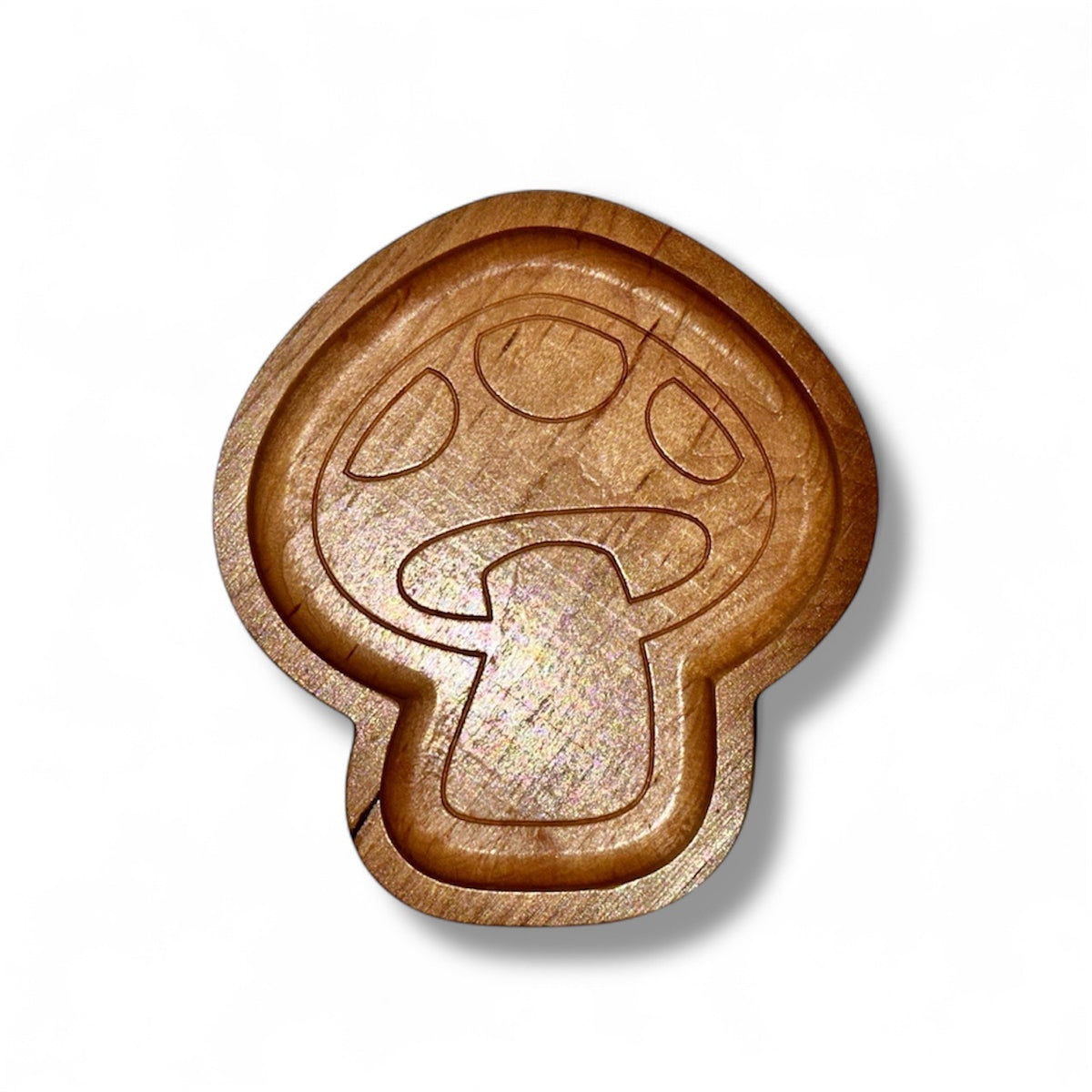 A hand-carved wooden mushroom-shaped tray with concentric circular grooves and a natural wood grain finish, shown on a white background with a soft drop shadow.