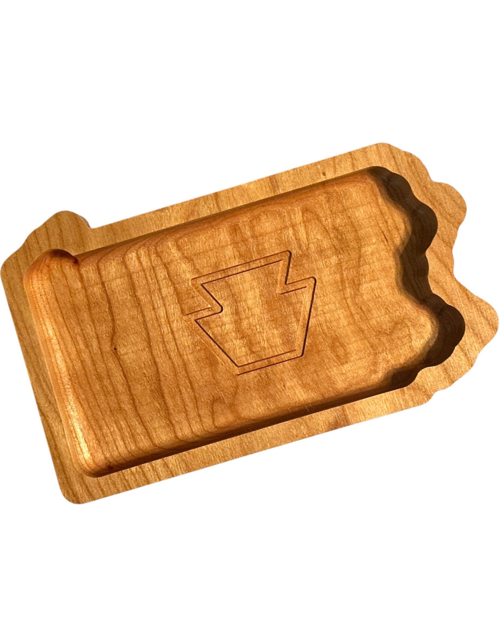 A rectangular wooden Pennsylvania tray with scalloped edges and an engraved keystone symbol in the center, shown on a plain white background.