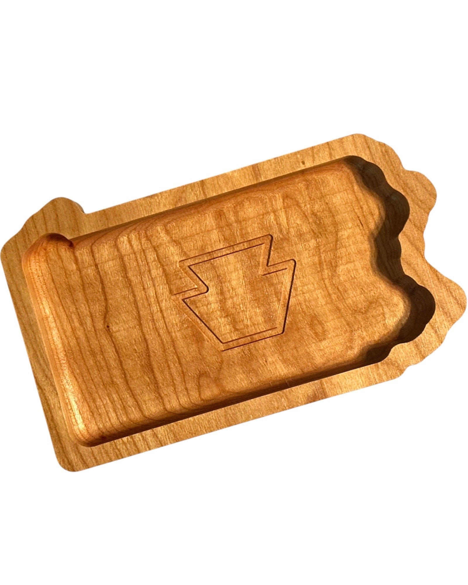 A rectangular wooden Pennsylvania tray with scalloped edges and an engraved keystone symbol in the center, shown on a plain white background.